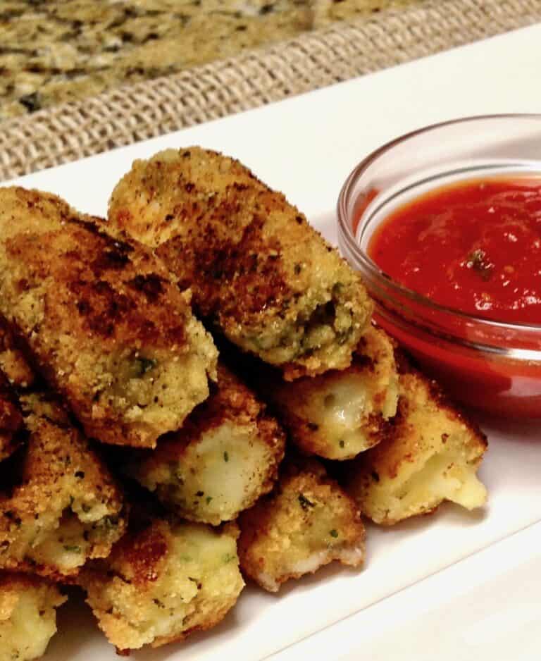 Keto/Low Carb/Gluten Free Mozarella Sticks on Serving Plate with Red Sauce