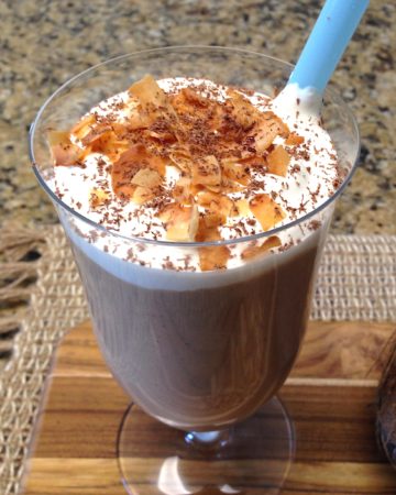 coconut shake in glass with toasted coconut on top