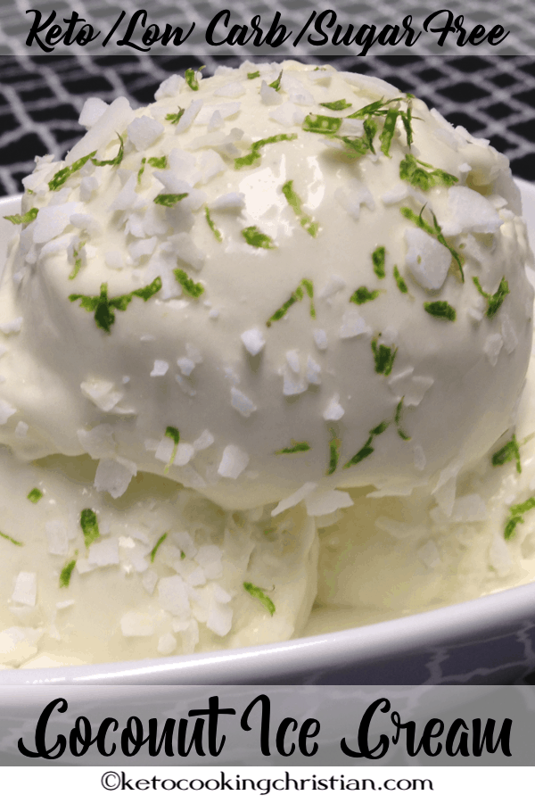 bowl of coconut ice cream with shredded coconut and lime zest on top