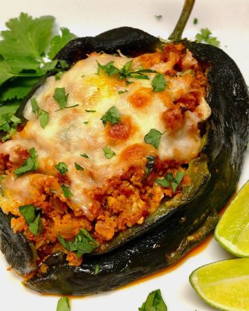 Stuffed Poblano pepper on white plate