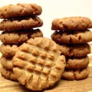 Keto Peanut Butter Cookies stacked on cutting board