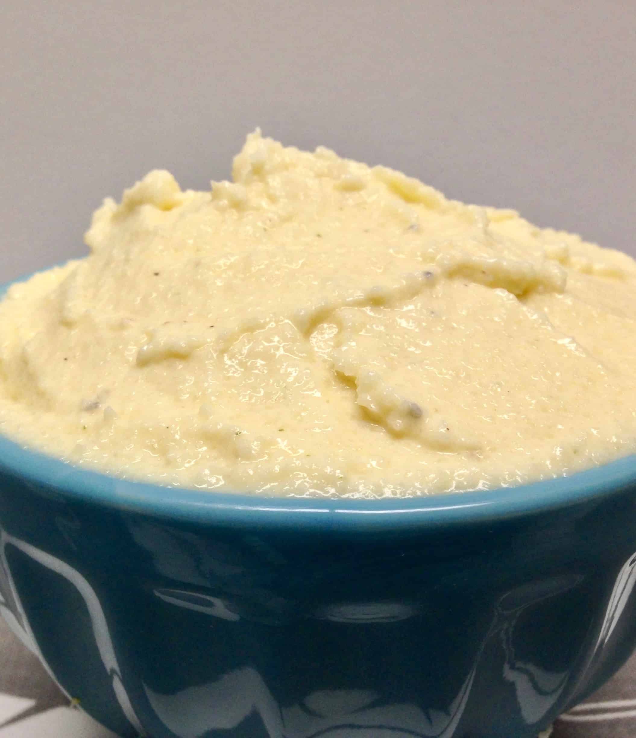 Cheesy Mashed Cauliflower - Keto and Low Carb Shredded cheddar and mascarpone cheese make this mashed cauliflower so creamy and full of flavor! #ketorecipes #keto #lowcarb #ketodiet #ketogenicdiet #bestmashedcauliflower #ketogenic #lowcarbhighfat #lowcarbmashedcauliflower #ketomashedcauliflower #ketocookingchristian