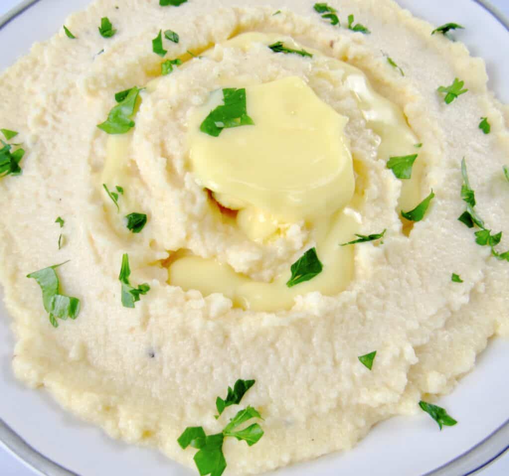 closeup of mashed cauliflower with butter on top