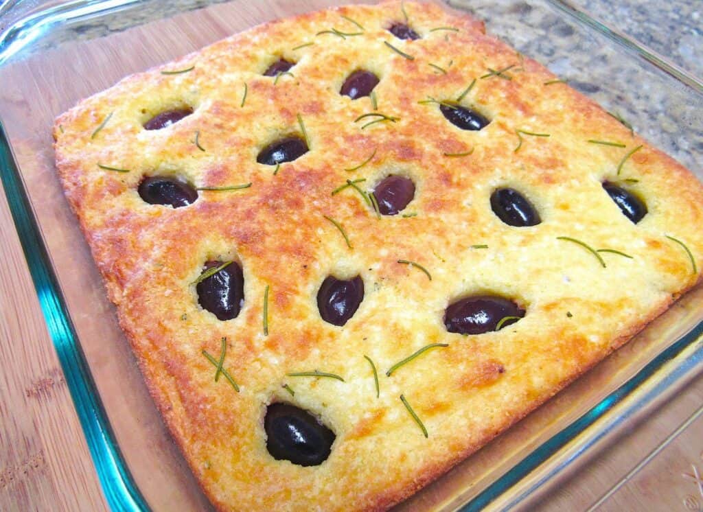 baked focaccia in glass square pan
