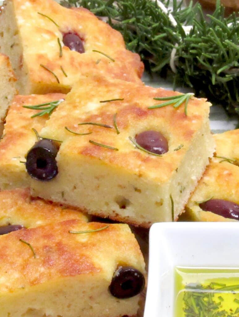 stacked up slices of rosemary and olive focaccia