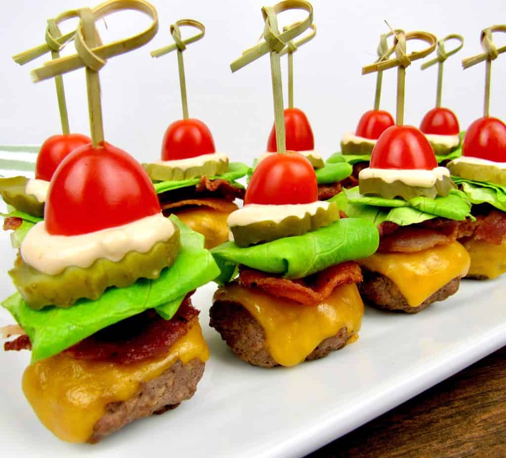Bacon Cheeseburger Bites lined up on white plate