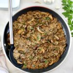 Easy Beef Stroganoff in skillet with serving spoon on side