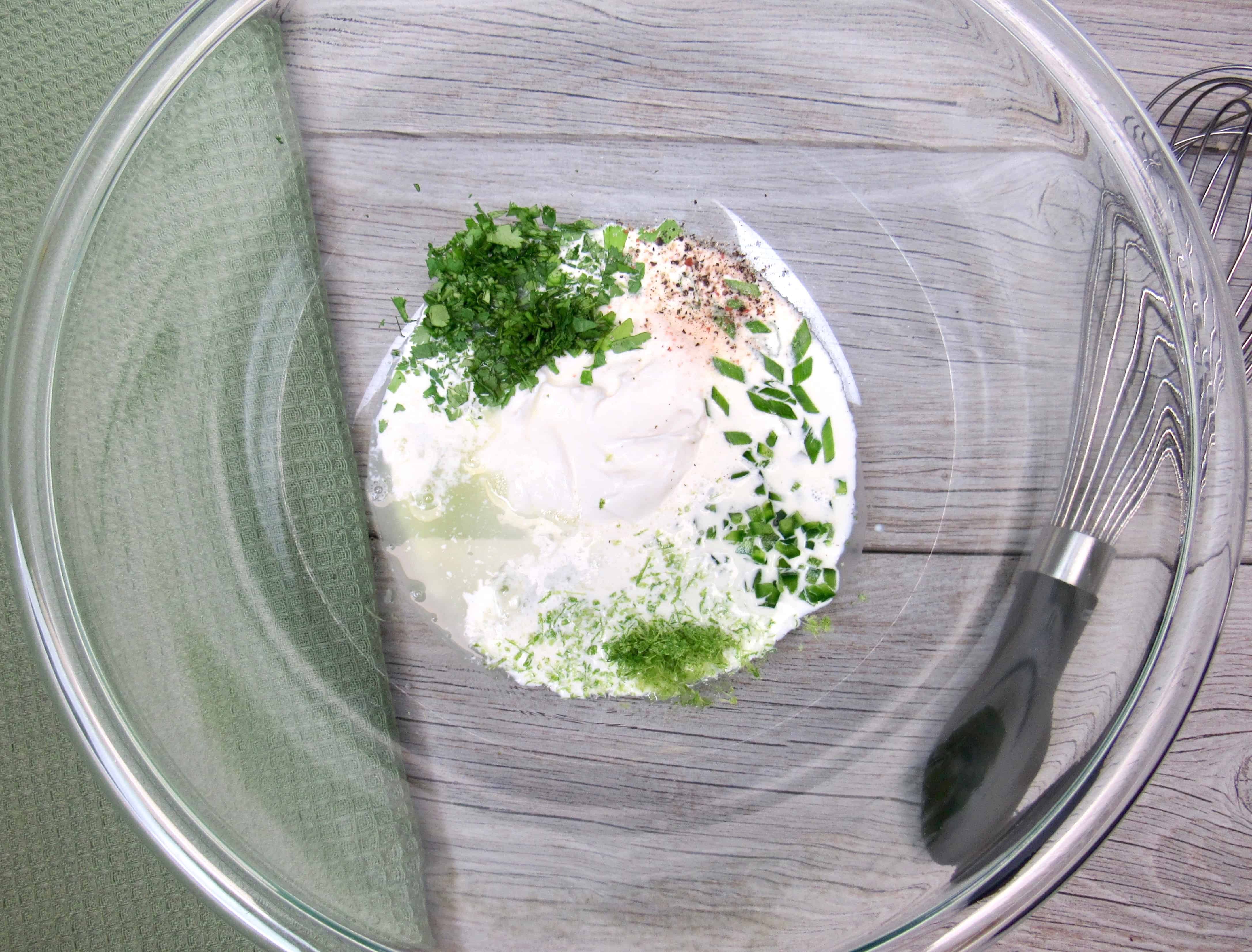 Lime Cilantro Broccoli Slaw dressing ingredients in mixing bowl unmixed