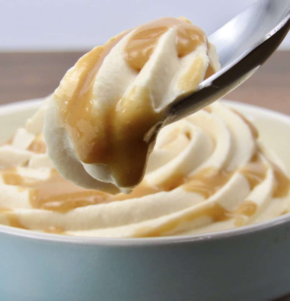 closeup of salted caramel mousse on spoon