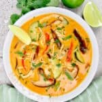 hai Coconut Curry Chicken Soup next to Lemons