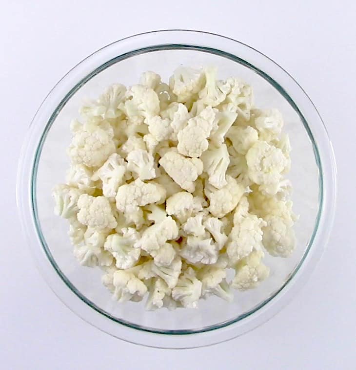 cauliflower florets in glass bowl