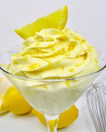 Lemon Cheesecake Mousse in martini glass with lemon slice on top