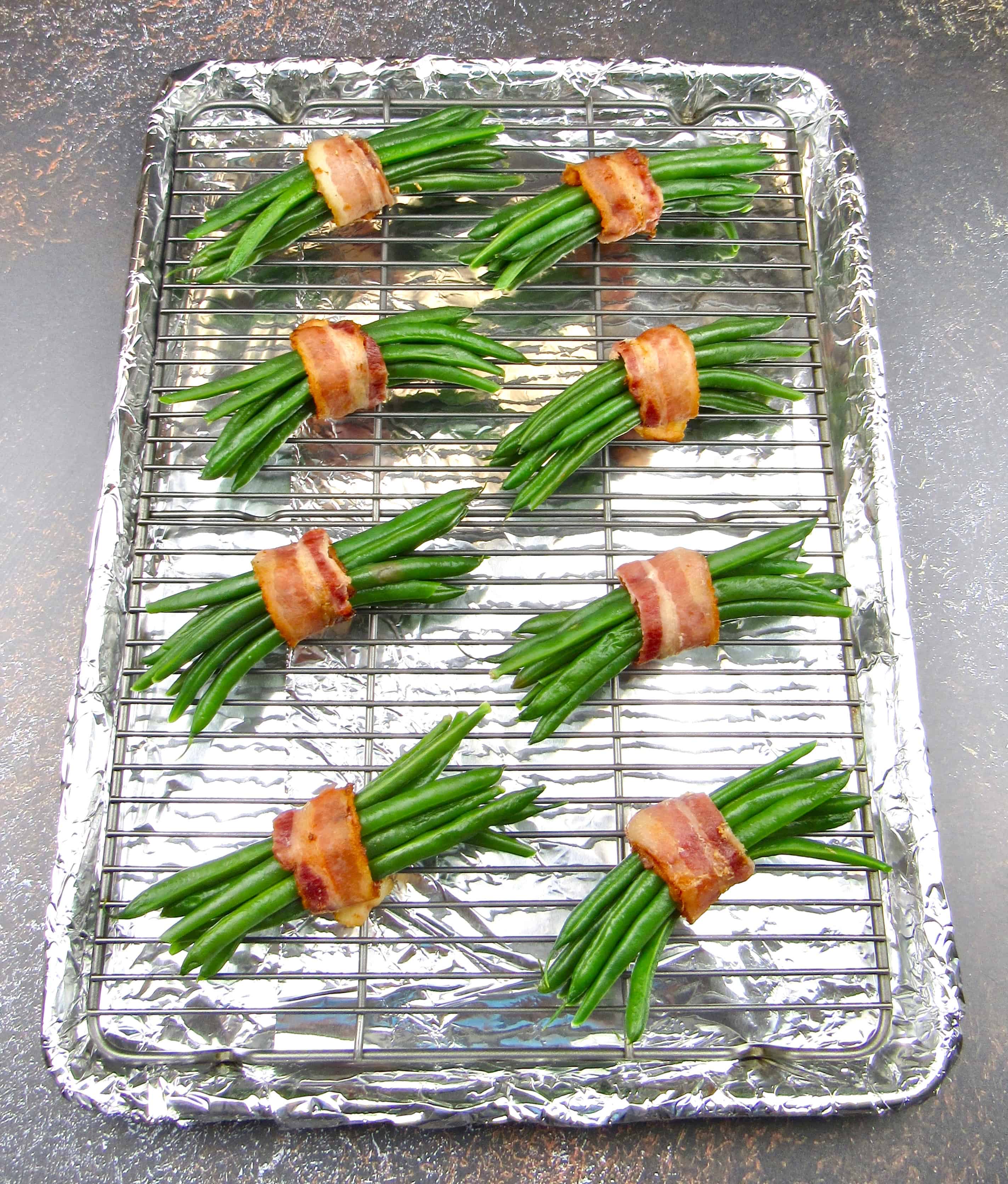 8 bundles of green beans wrapped in bacon