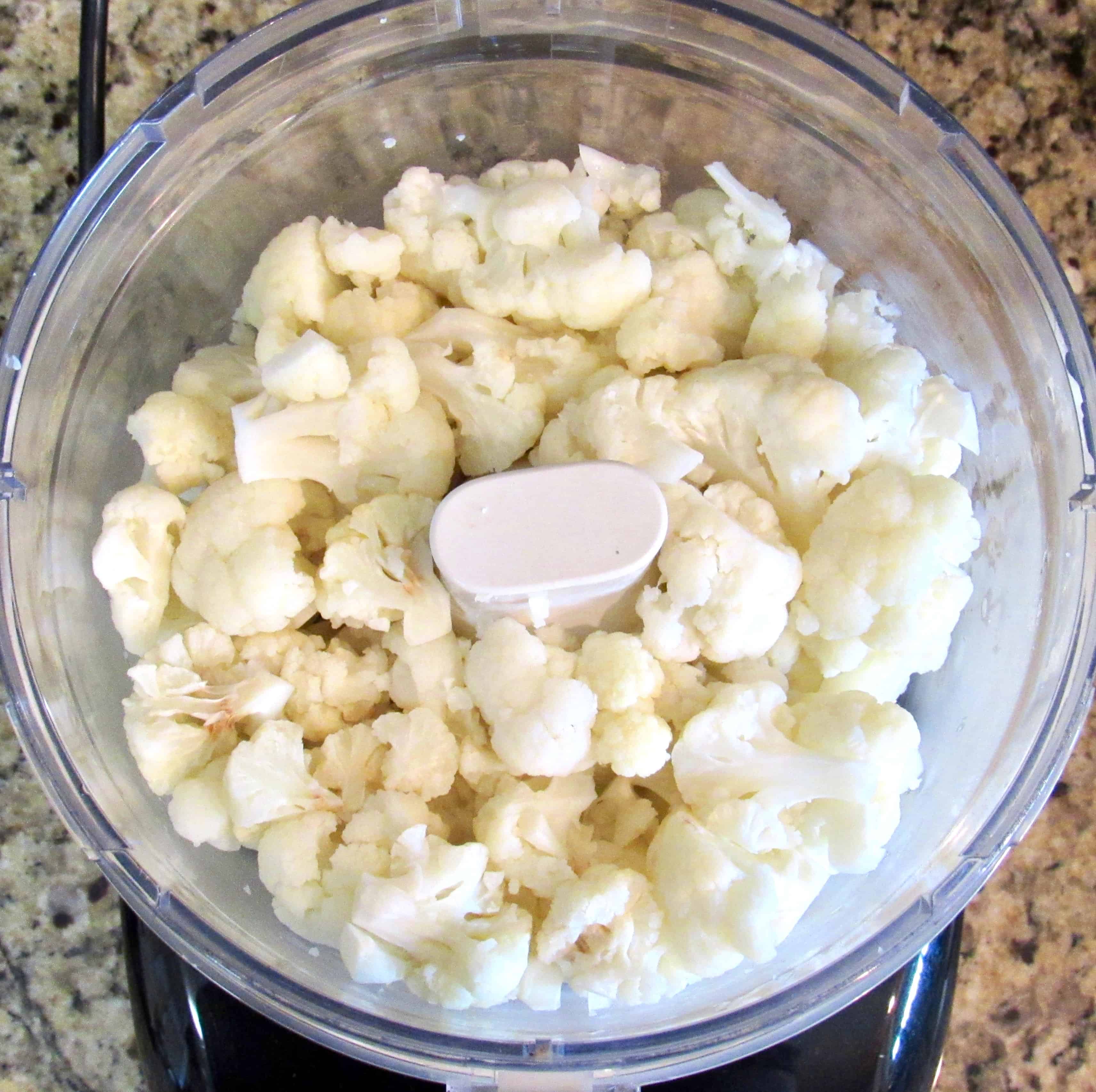 cauliflower florets in food processor bowl