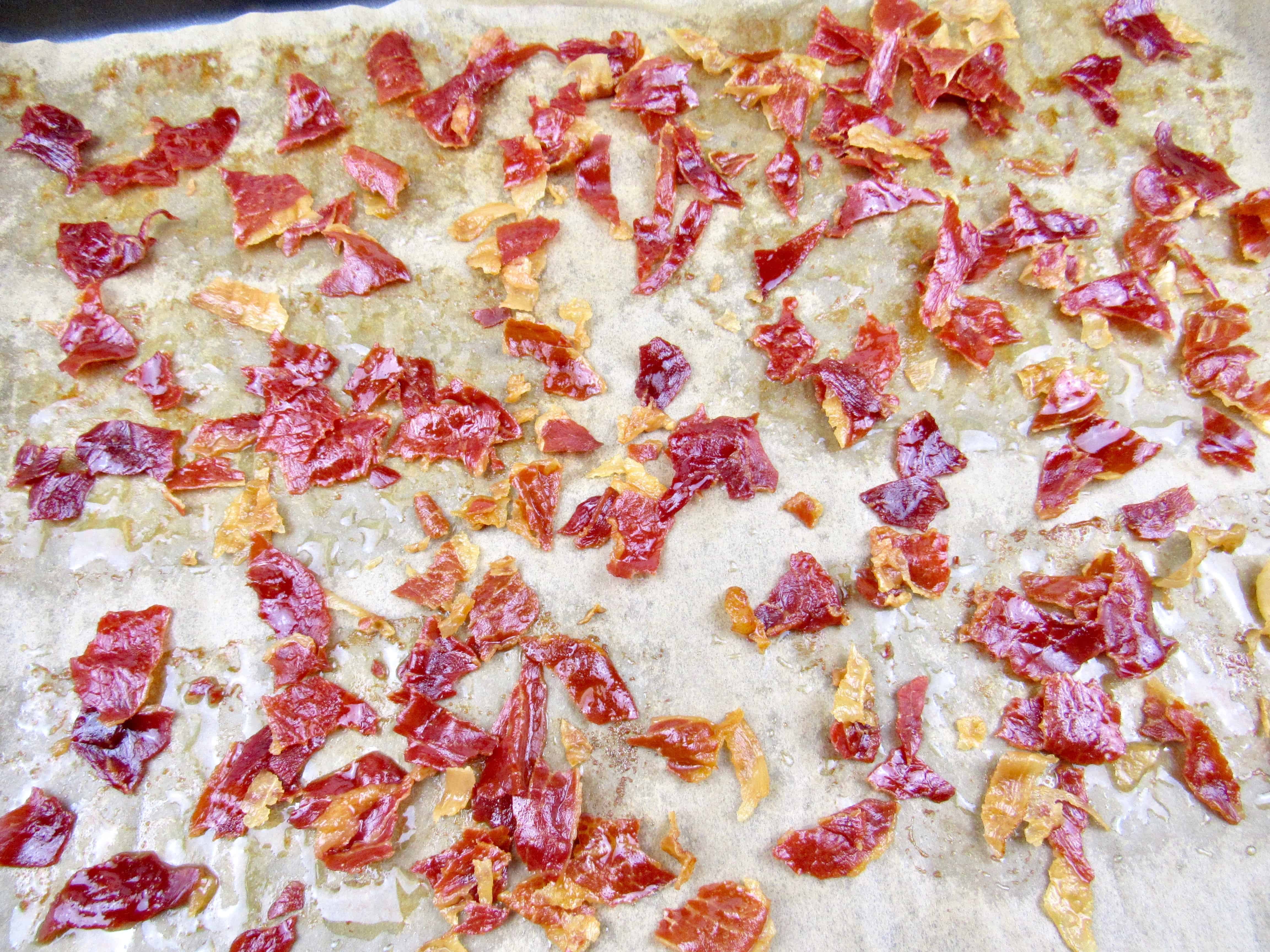 crumbled prosciutto on sheet pan