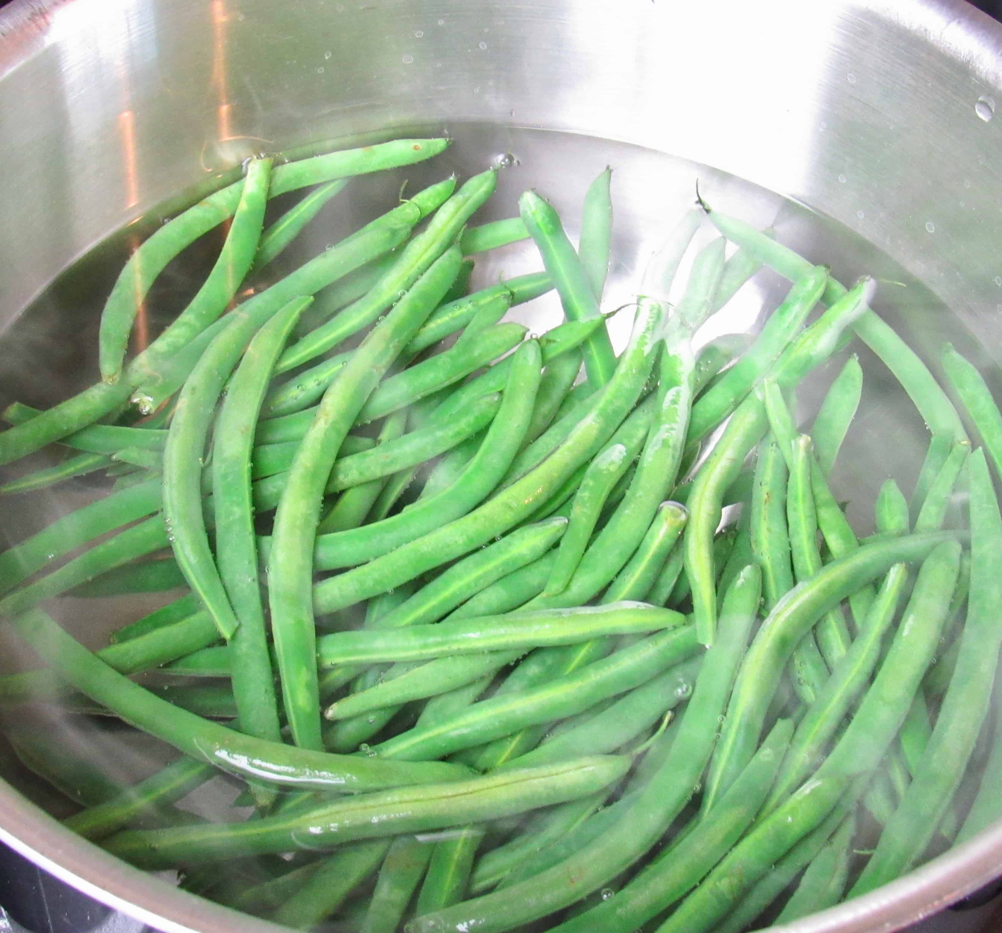 green beans in boiling water pot