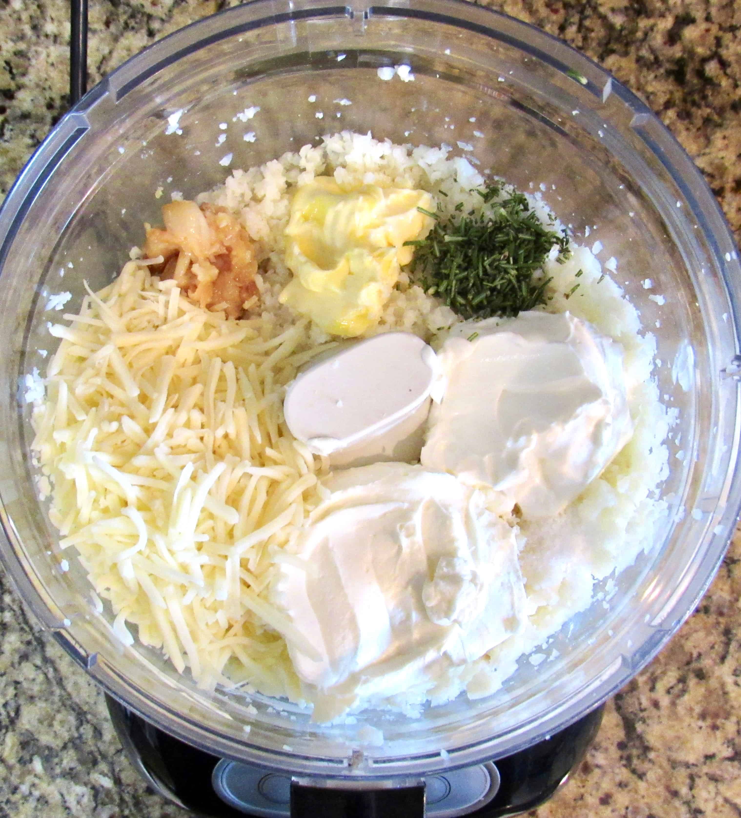 cauliflower mash ingredients in food processor bowl