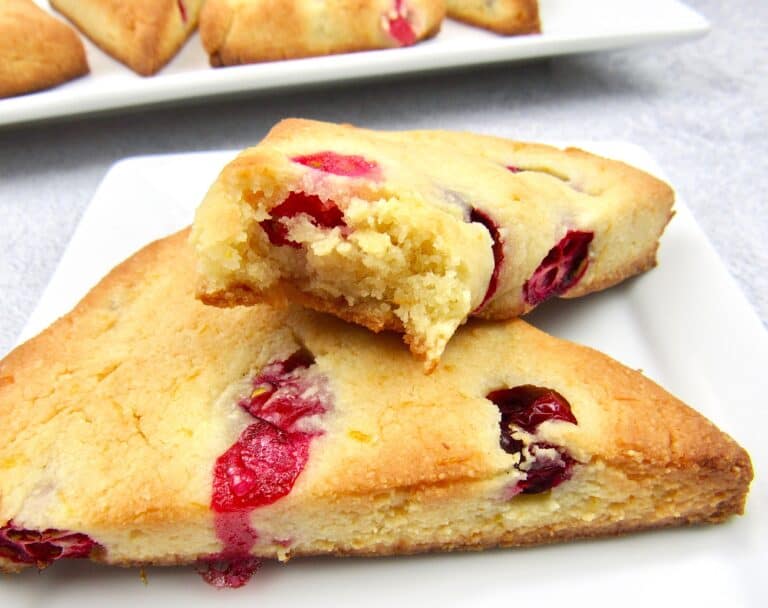 closeup of cranberry scones with bite taken out