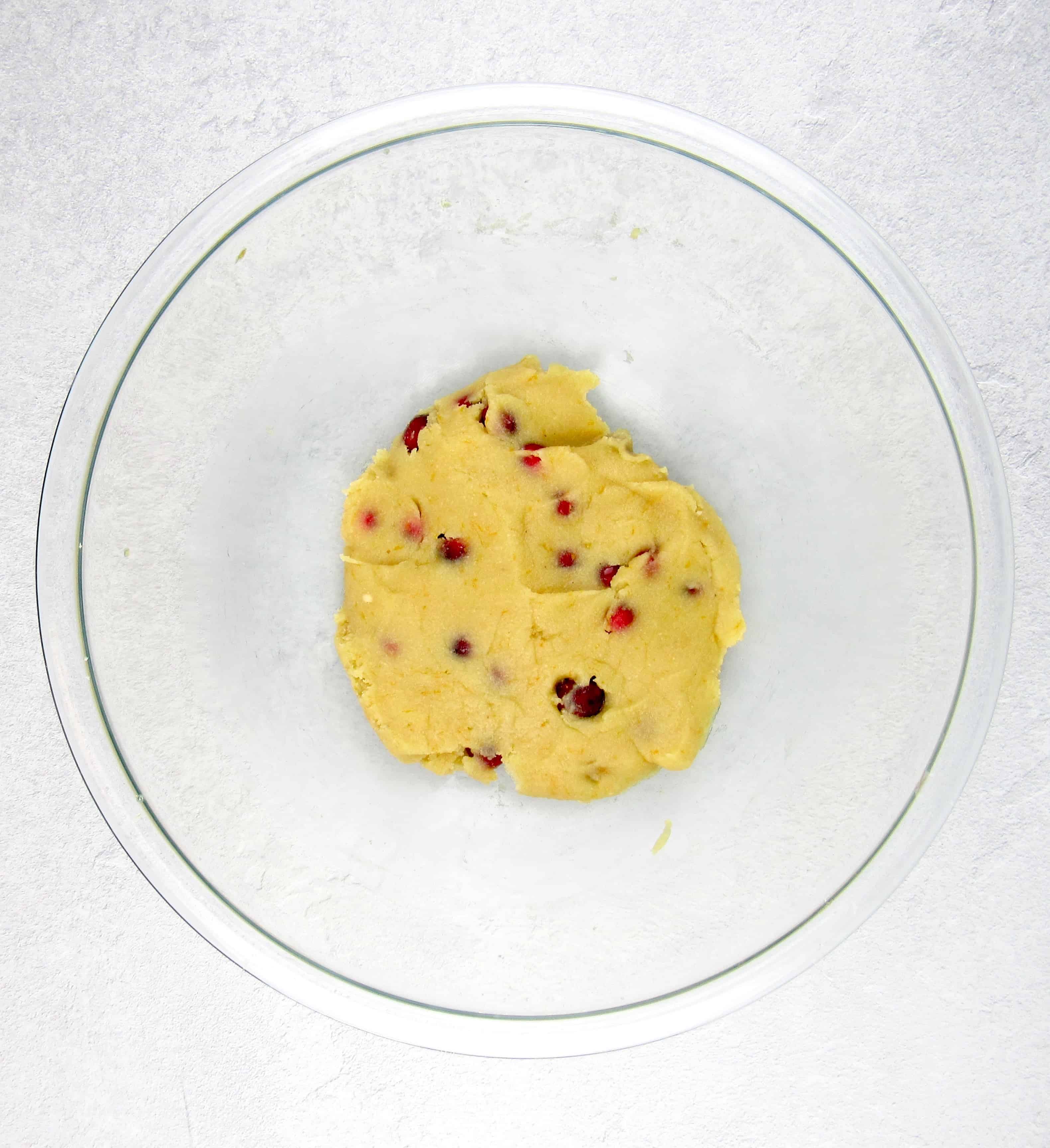 cranberry scones dough in glass bowl