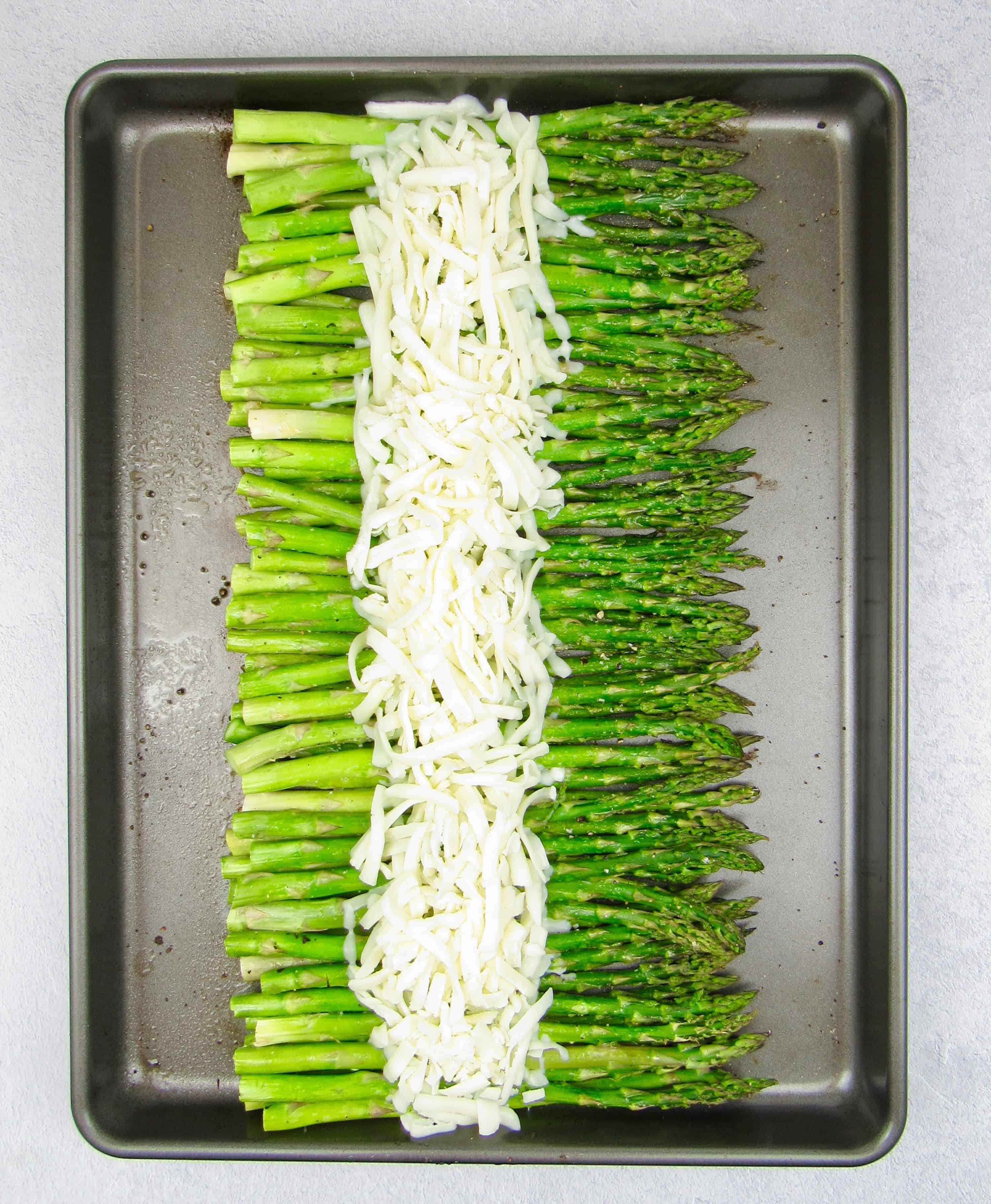 Asparagus with shredded mozzarella sheet pan
