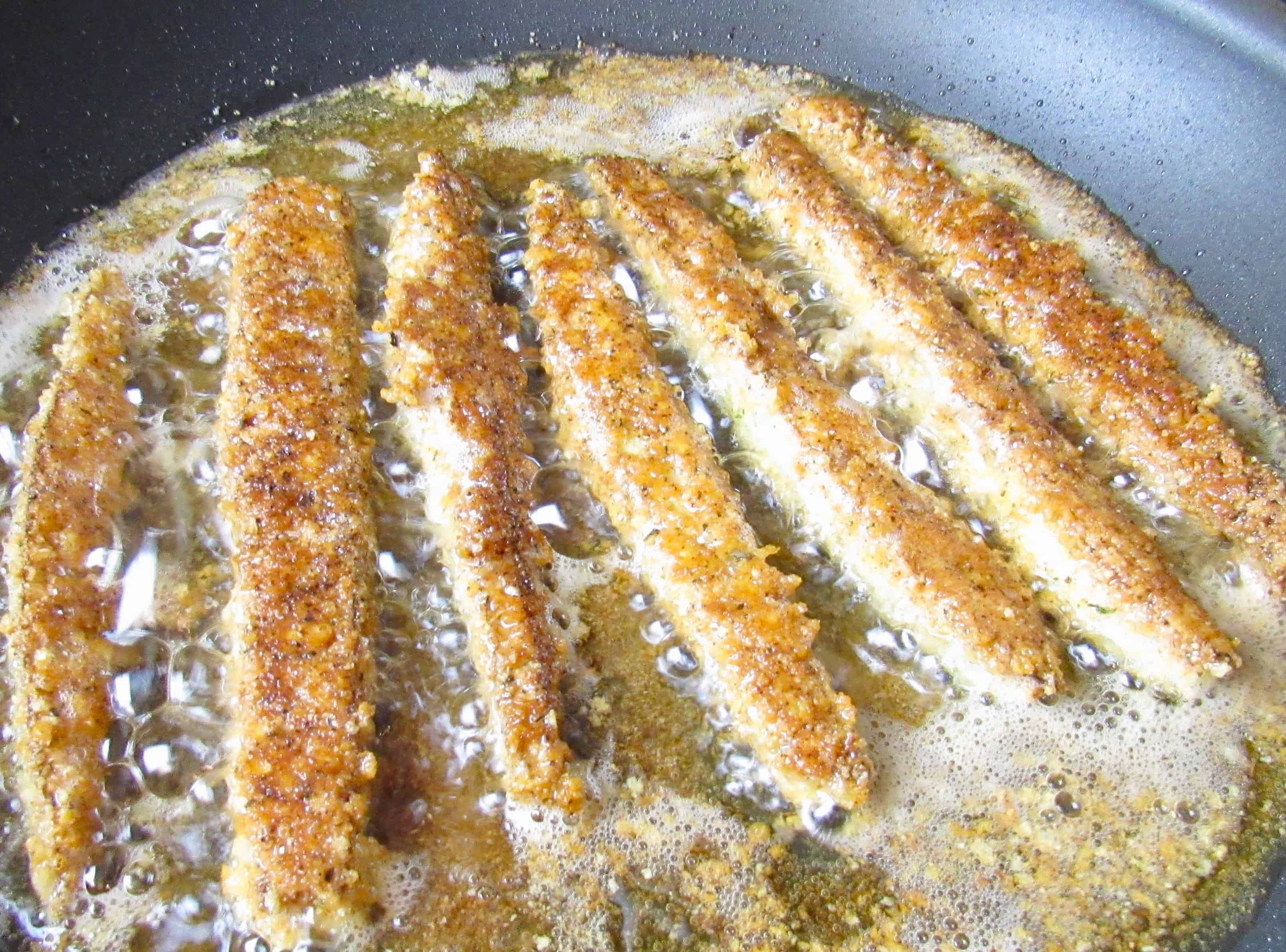 eggplant fries frying in skillet