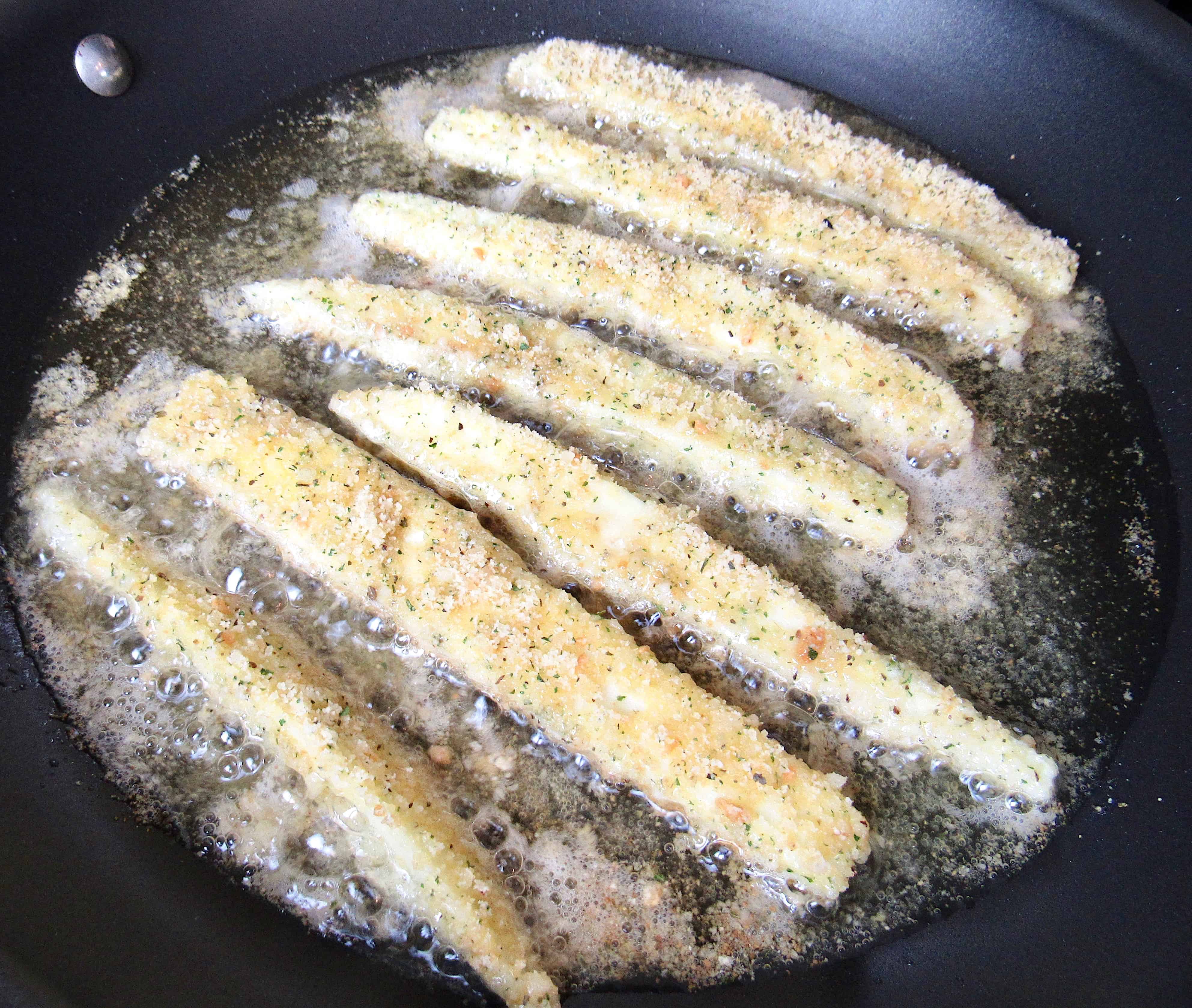 eggplant fries in frying pan