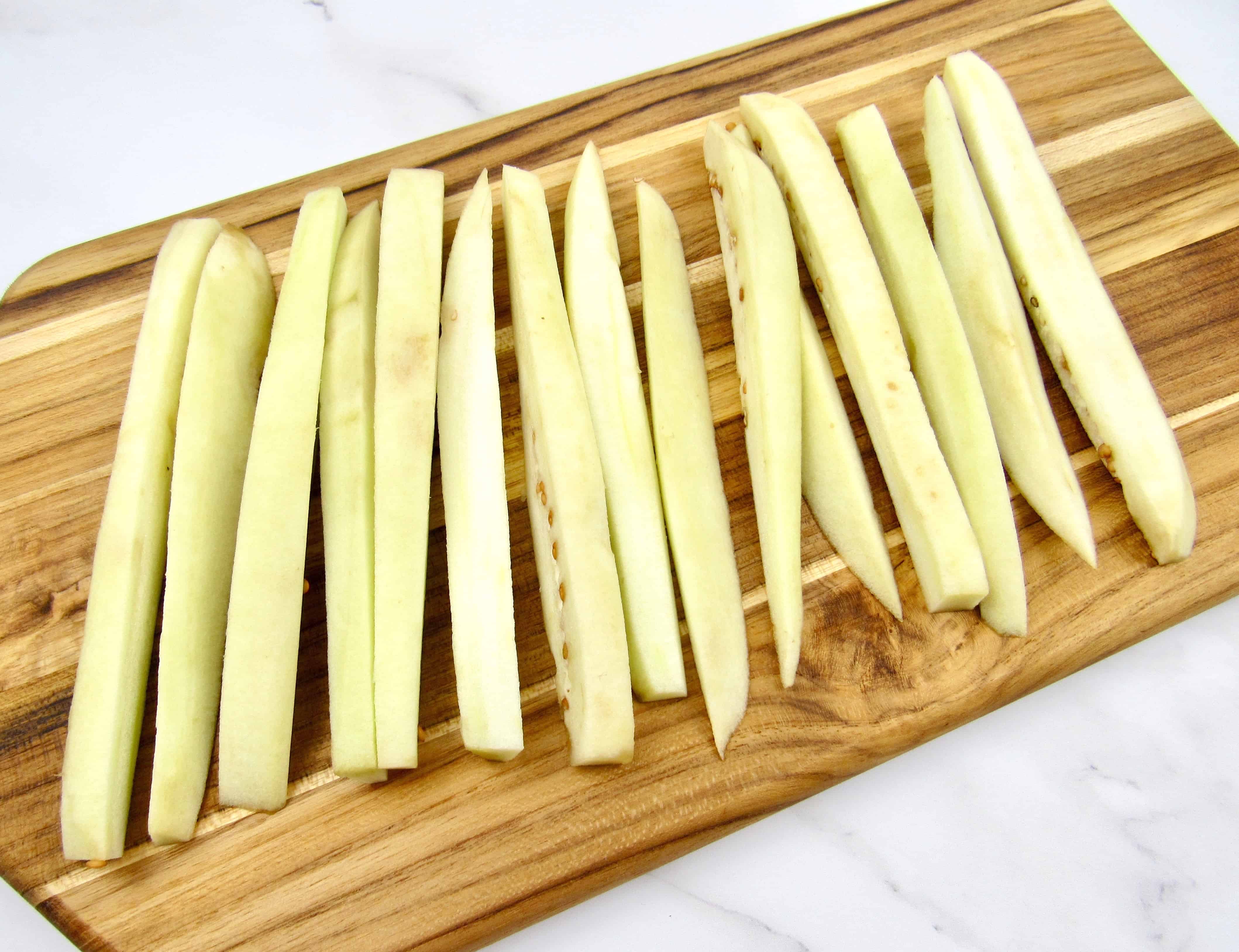cut eggplant fries on cutting board