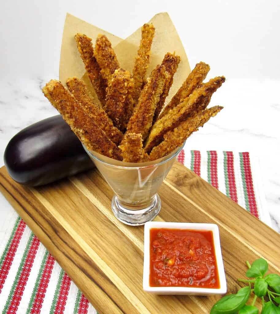 eggplant fries in glass with marinara on side