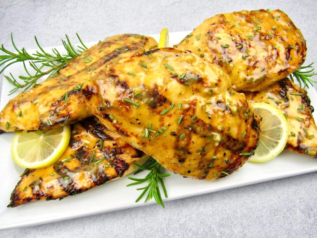 closeup of grilled chicken with citrus glaze