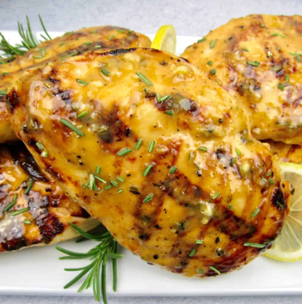 closeup of grilled chicken with citrus glaze