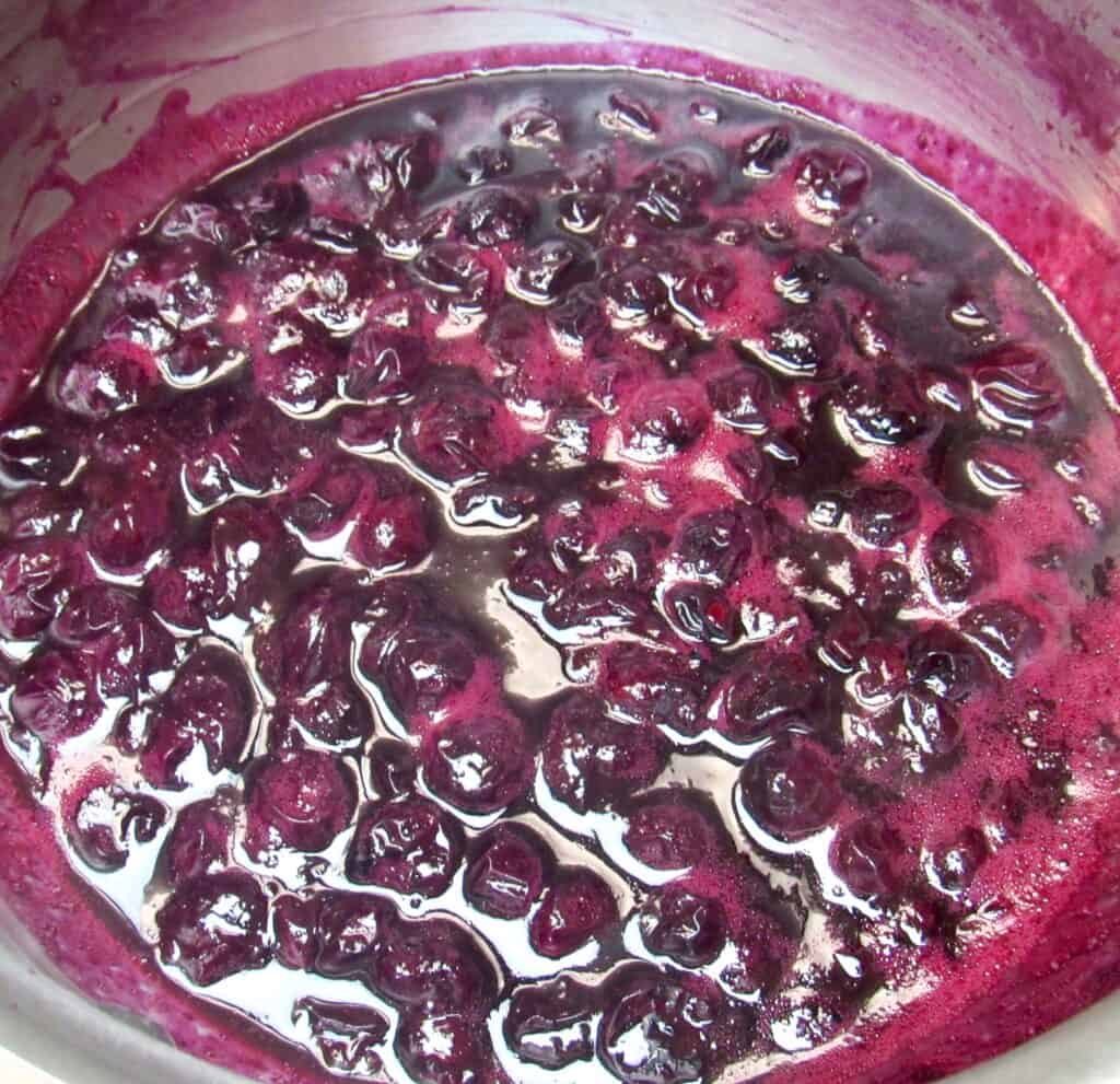blueberry sauce cooking in pan