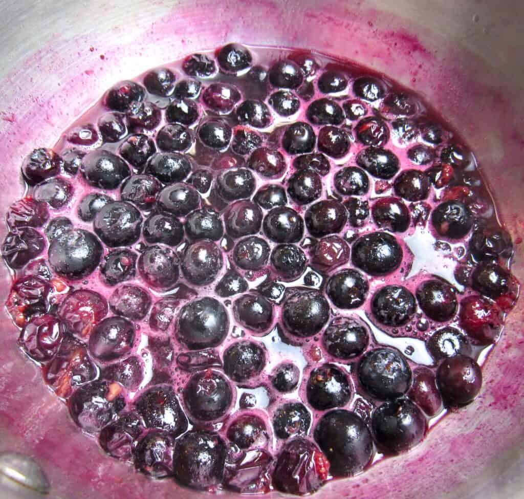 blueberries cooking in saucepan