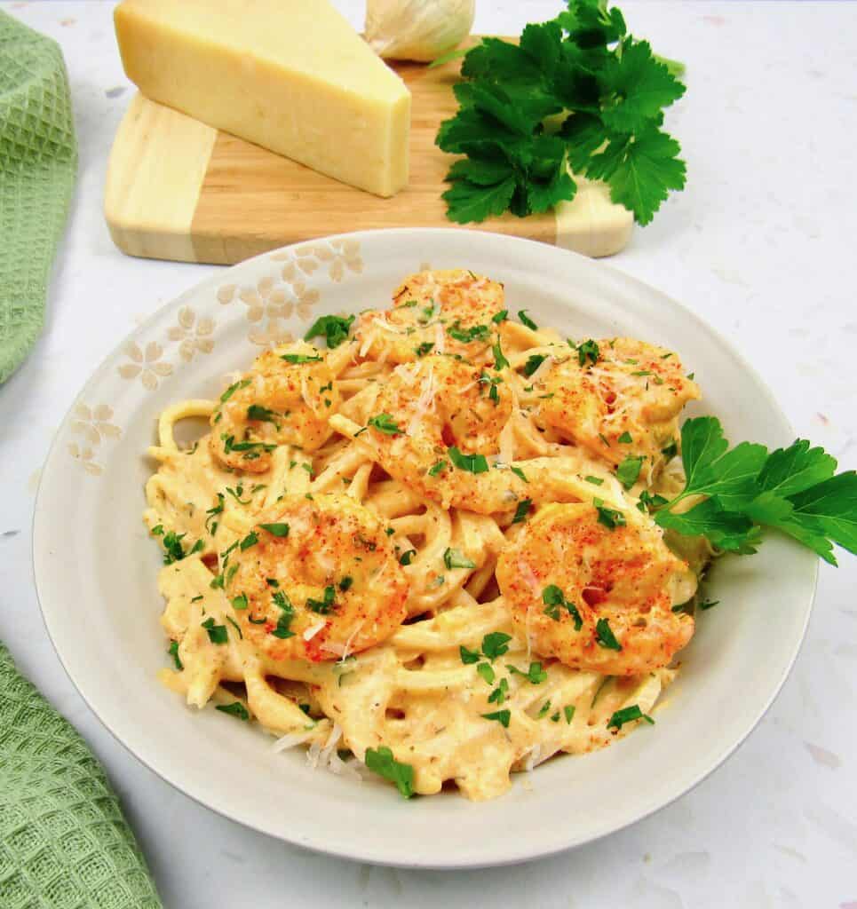 bowl of cajun shrimp with palmini noodles in alfredo sauce