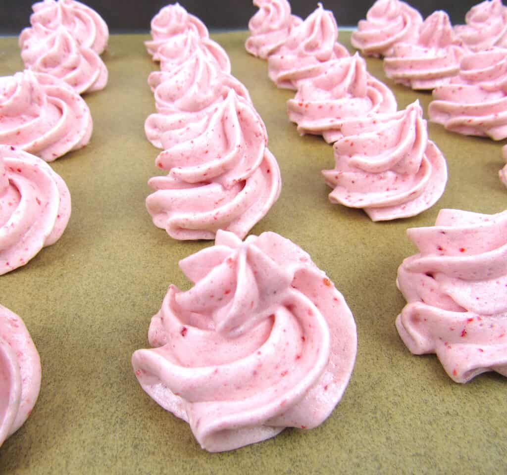 Keto Strawberry Meringue Cookies on baking sheet