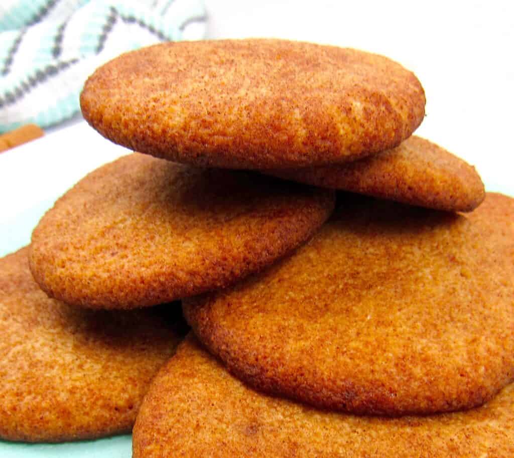 stack of snickerdoodle cookies on plate
