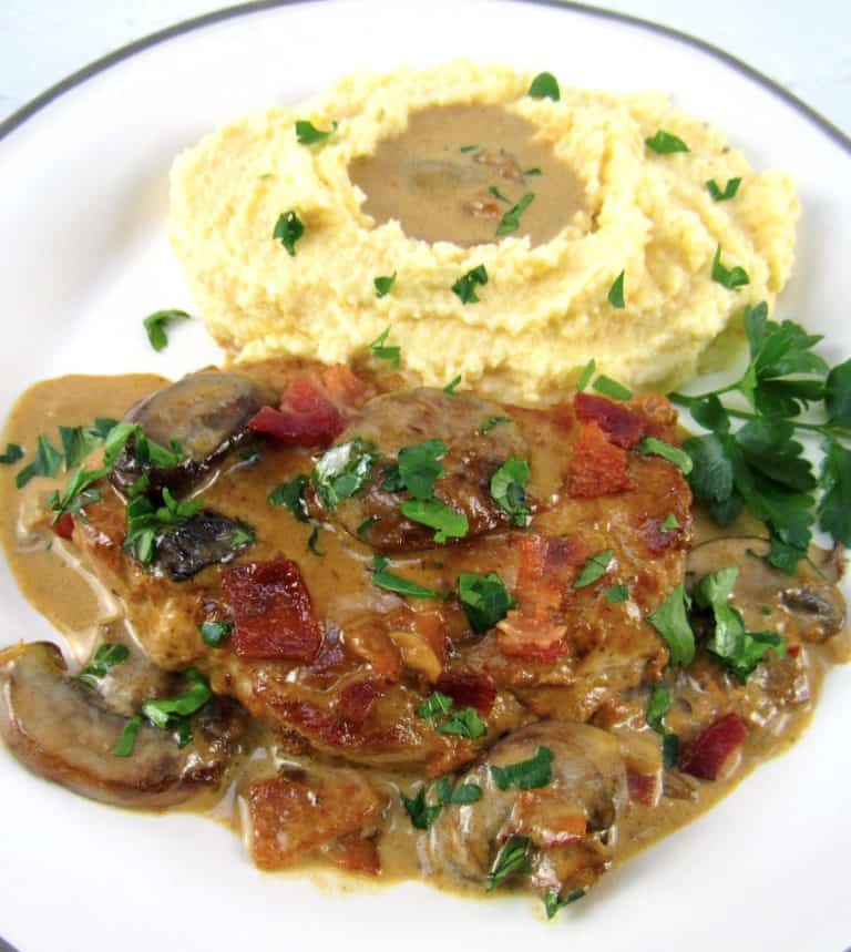 overhead view pork chop with mushroom gravy and mashed cauliflower