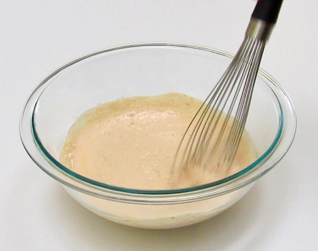 banb bang sauce in glass bowl with whisk