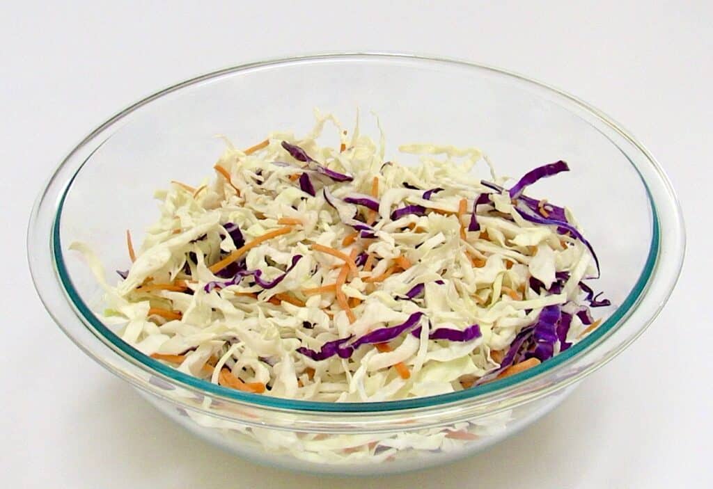 coleslaw mix in glass bowl