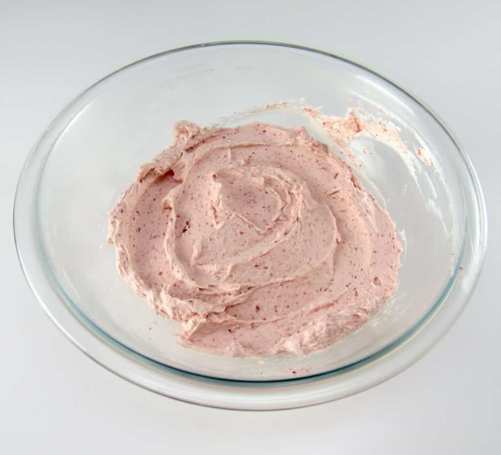 strawberry frosting in glass bowl