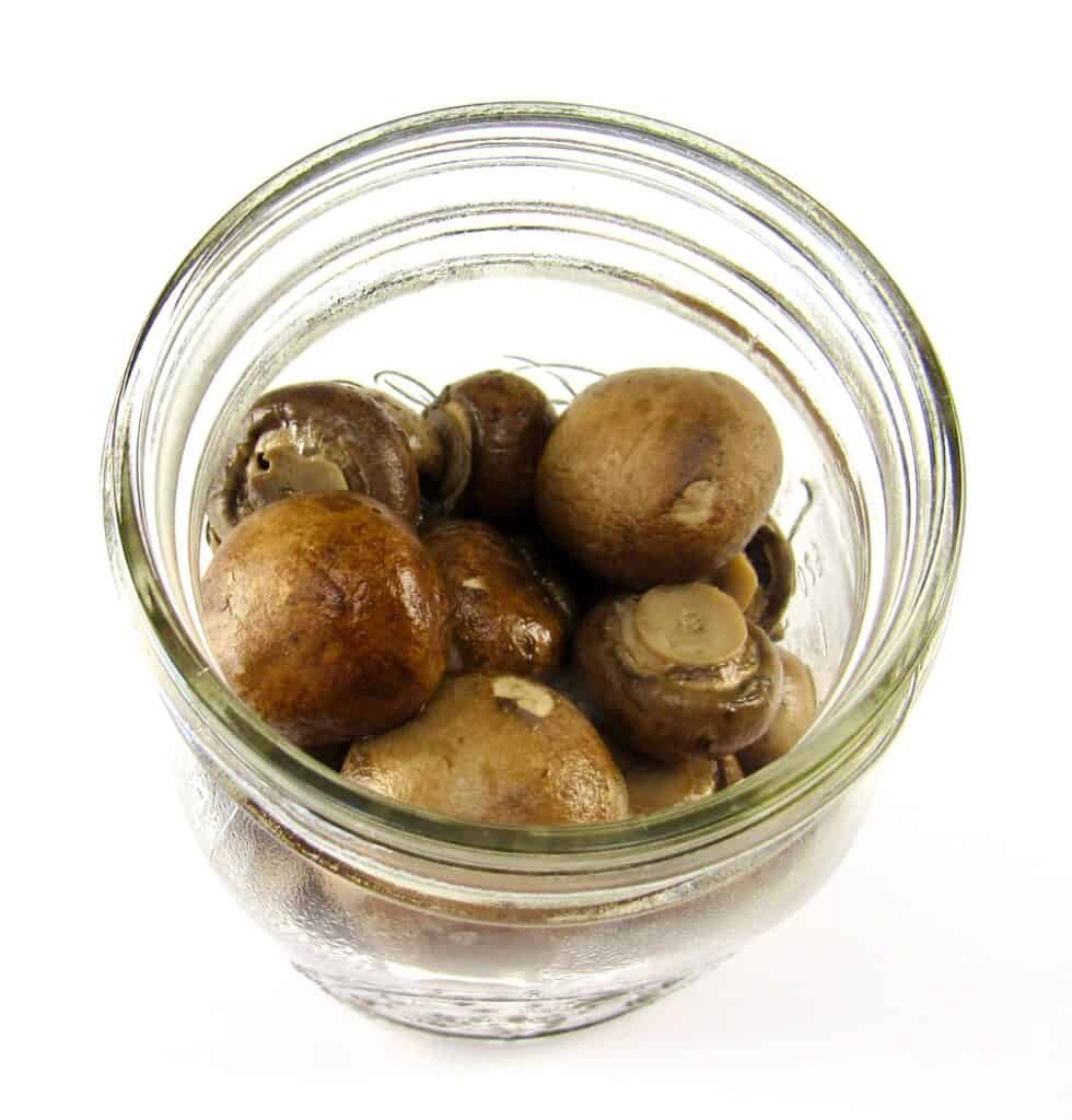 boiled mushrooms in canning jar
