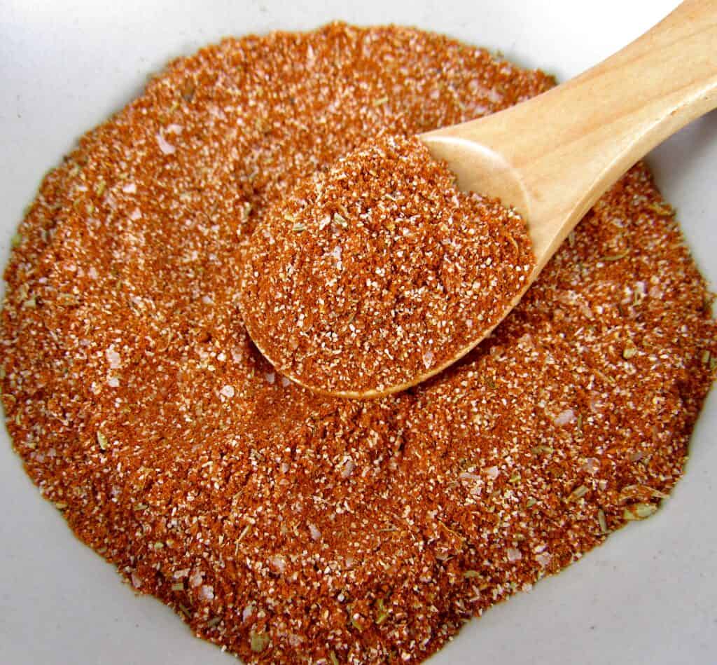 blackened seasoning mix in bowl with wooden spoon