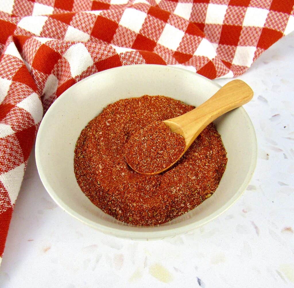 blackened seasoning mix in bowl with wooden spoon