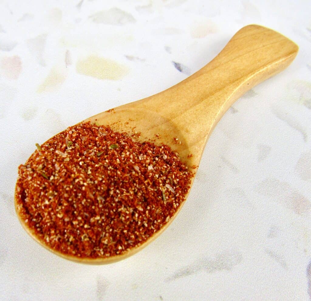 blackened seasoning mix in wooden spoon