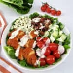 buffalo chicken salad with blue cheese on top