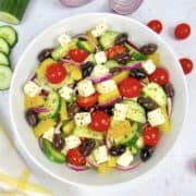 greek salad in white bowl