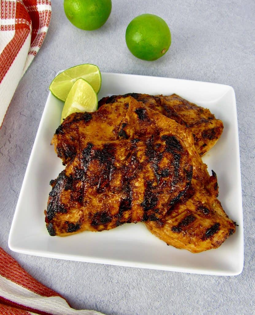 overhead view of closeup of grilled chipotle lime chicken on plate