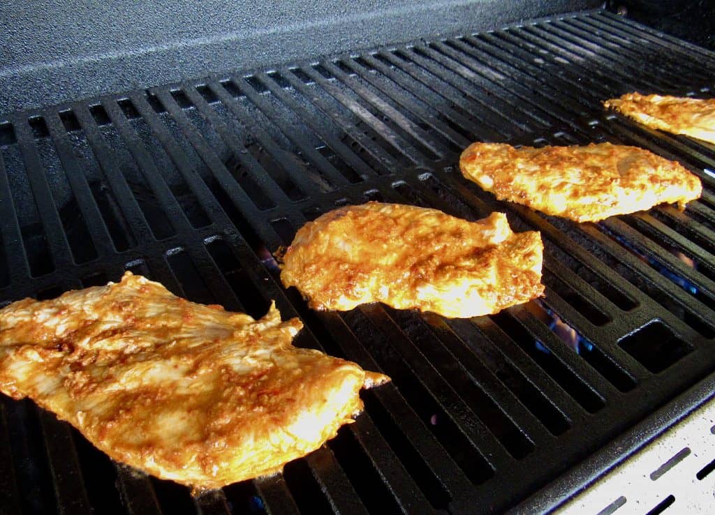 marinated chicken on the grill