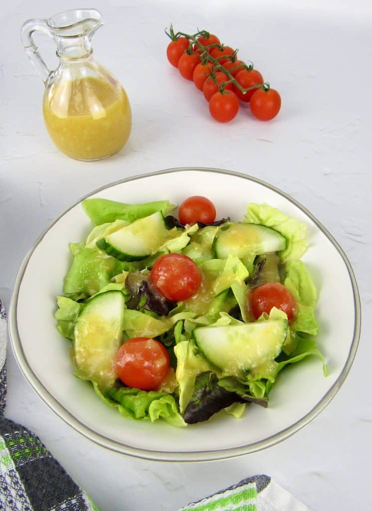 overhead view of salad with apricot dressing on top