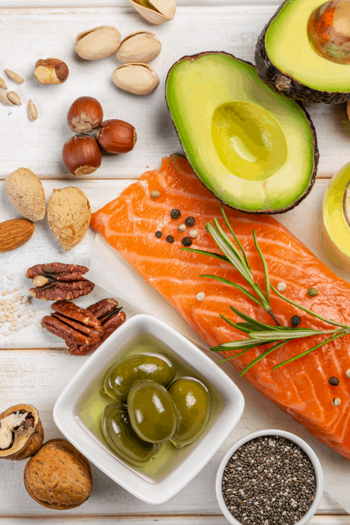 Healthy Fats for Keto on white wood background