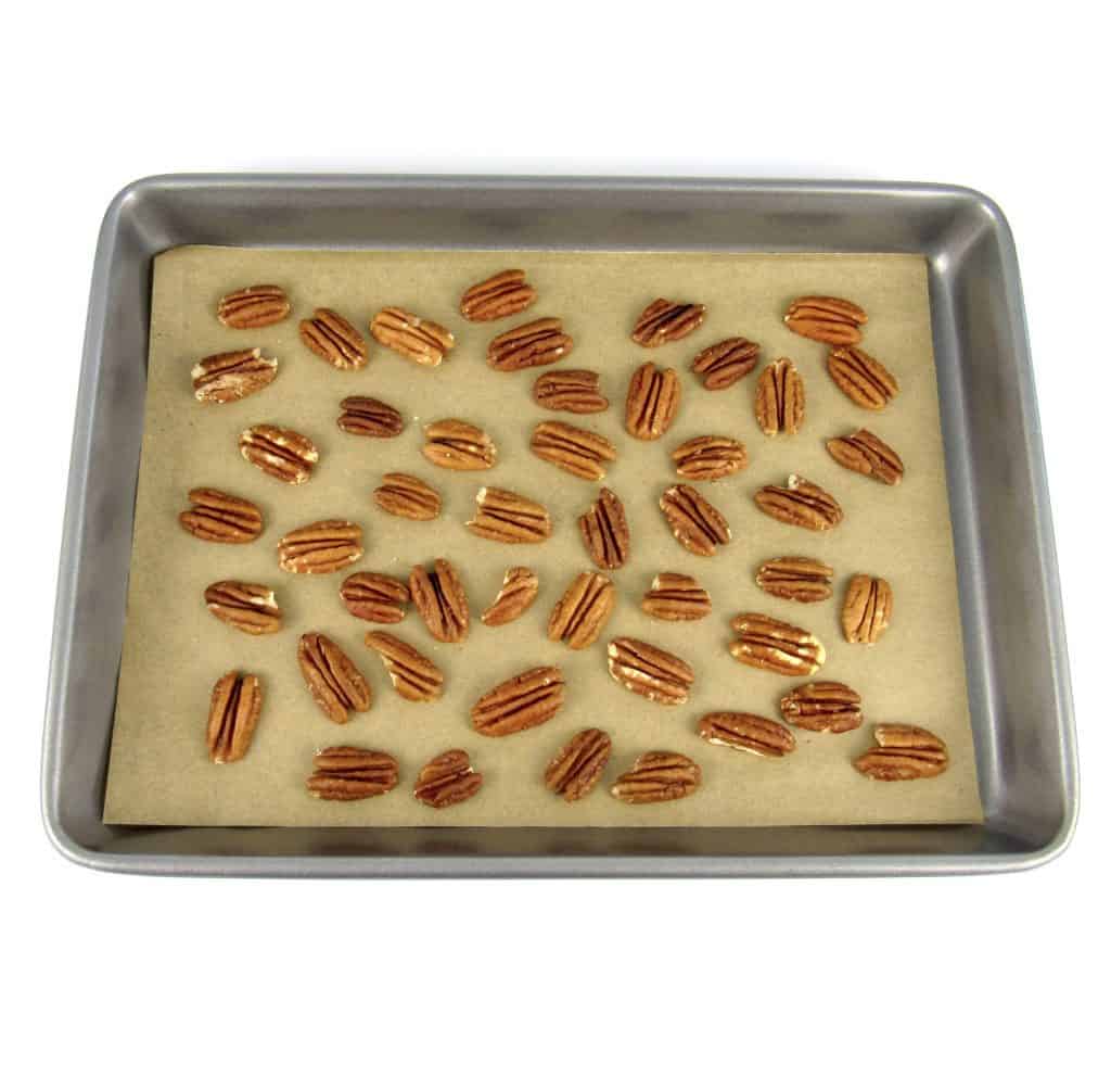 pecans on baking sheet